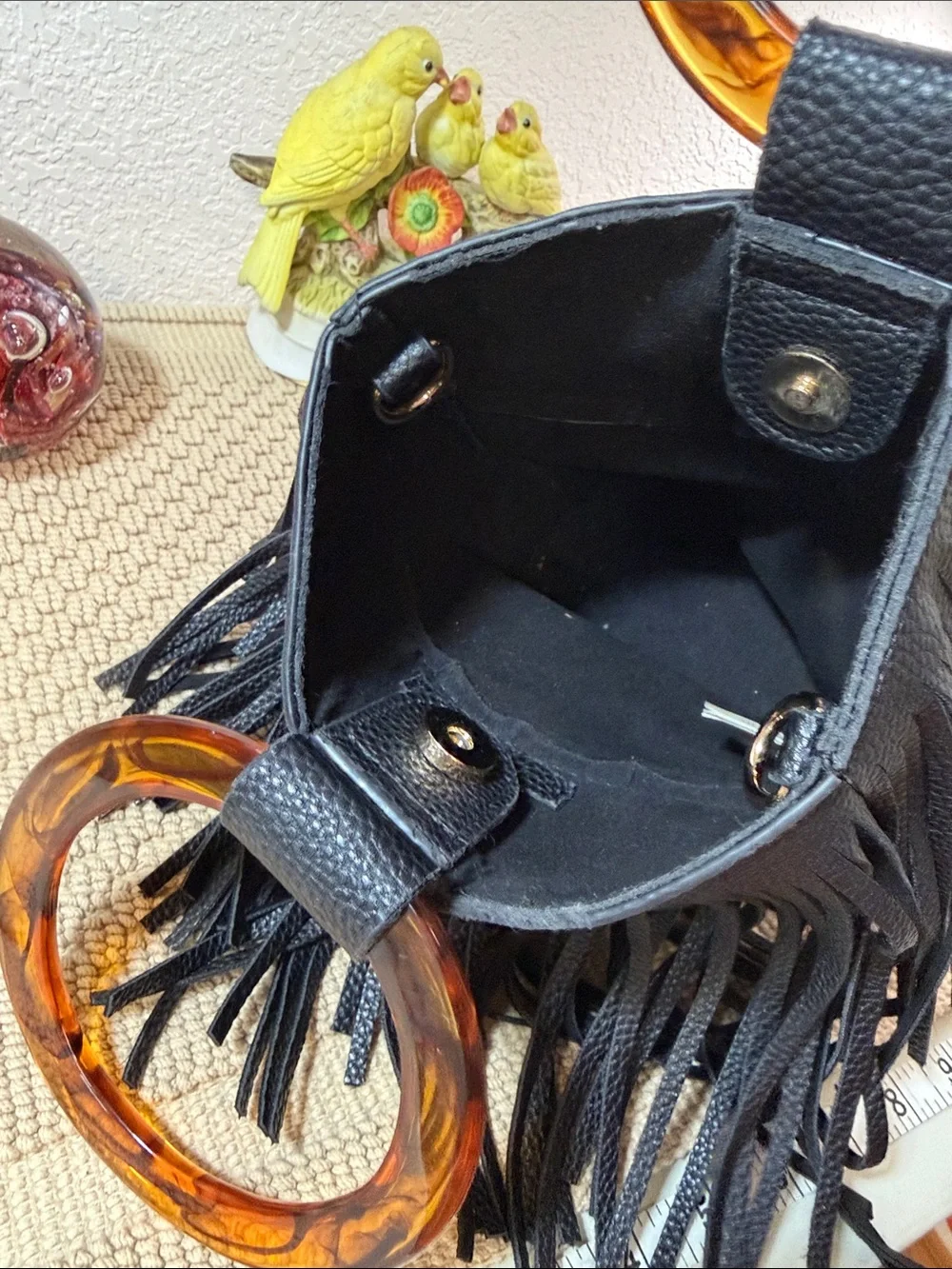Black Fringed Wristlet with Amber Acrylic Ring Handle